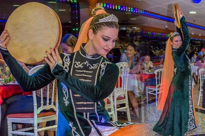 Bosphorus Sightseeing Cruise with Turkish Live Show and Dinner - Dolmabahçe Palace: a huge, theatrical riverside view