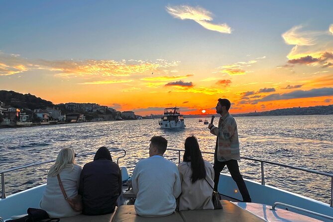 Bosphorus Sunset or Daytime Yacht Cruise with Snacks & Live Guide - Dolmabahçe Palace from the water: the sunset photo you’ll remember