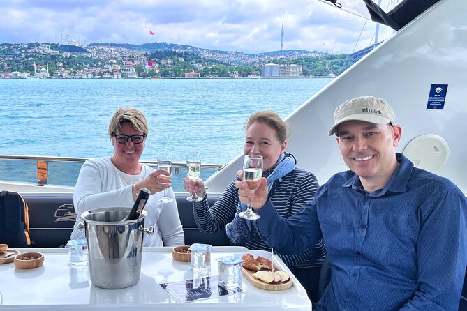 Bosphorus Yacht Cruise with Stopover on the Asian Side - (Morning or Afternoon) - Bosphorus sights from the water, including bridges, mosques, and fortresses