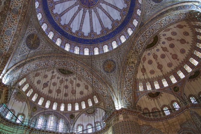 Guided Hagia Sofia, Blue mosque, Basilica Cistern skip lines tour - Blue Mosque in 30 minutes: Sultanahmet, blue tiles, and active-mosque rules