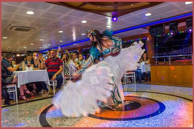 Istanbul Bosphorus Cruise with Dinner and Belly-Dancing Show - Dinner on Board: Unlimited Local Drinks, Table Service, and Real Expectations
