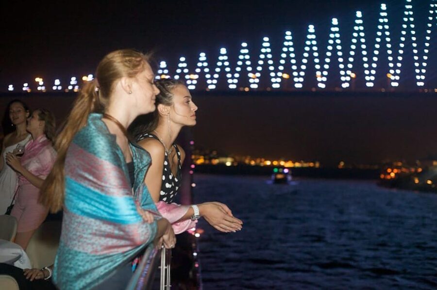 Istanbul: Bosphorus Night Dinner Cruise with Private Table - The route and stops: bridges, palaces, and the Maiden’s Tower area