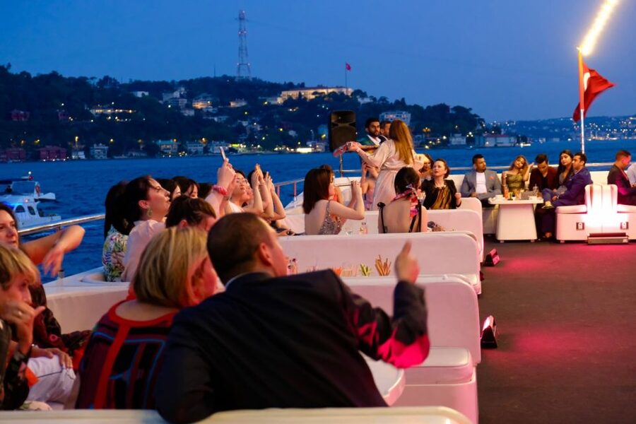 Istanbul: Bosphorus Sunset Cruise with Dinner - Getting on the boat at Kabatas, then easing into the water