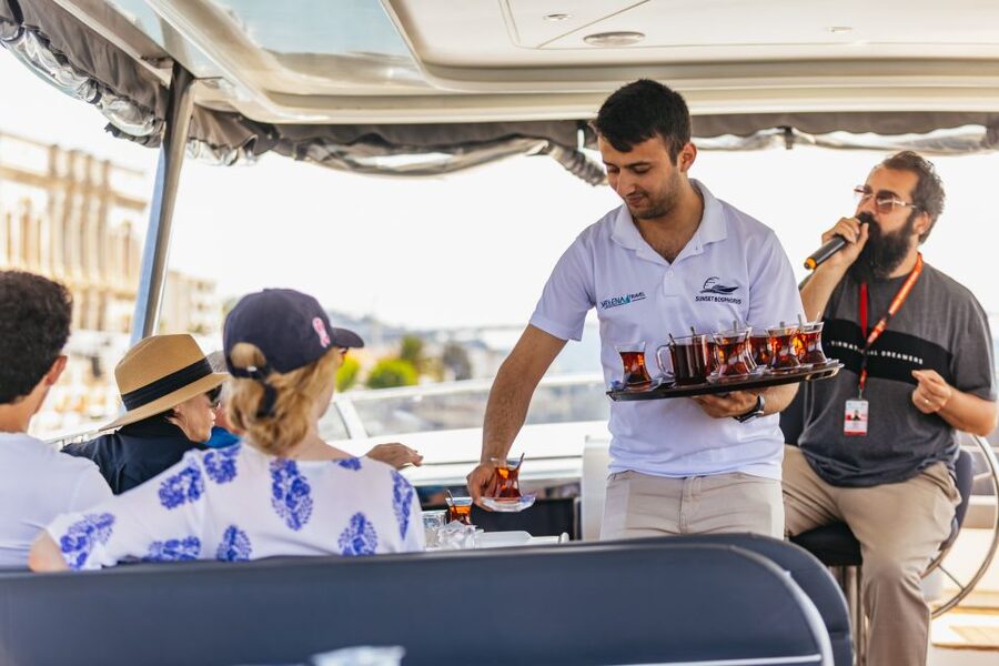 Istanbul: Bosphorus Yacht Cruise with Stopover on Asian Side - What the onboard experience feels like, snacks, tea, and deck time