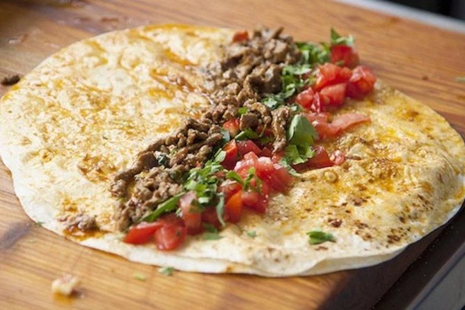 Istanbul Food Walking Tour of Beyoglu by Night - Dürümzade near the fish market: crispy wrap logic, explained by taste