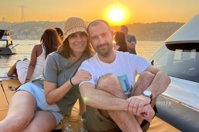 Istanbul Sunset Cruise on Luxury Yacht - Guided Group Cruise - Dolmabahçe Palace and Beşiktaş waterfront views from the Bosphorus