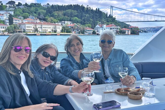 Luxury Bosphorus Yacht Tour – Asian Side Stop & Exploration - Bridges, Galatasaray Island, and the residential shoreline rhythm